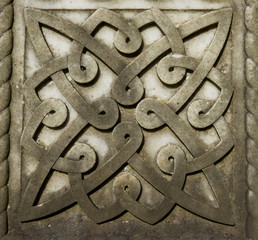 stone carved Celtic design symbols background