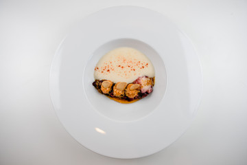 Close-up of a modern molecular dish in a white plate