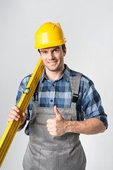 Workman with level tool