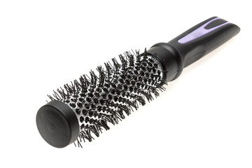 Round hairbrush. Brush for straightening, adding volume or creating curls for medium and long hair. Barber tool. Isolated on white.