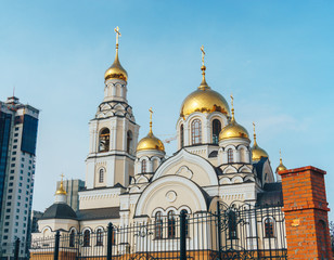 Fototapeta na wymiar New building of orthodox church in Voronezh city against the blue sky