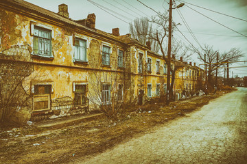 Fototapeta na wymiar district of poor residential buildings, architecture background, dark mood depression