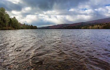 Cloudy sky above Wyman Lake in western Maine.