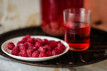 Conserve raspberry drink.