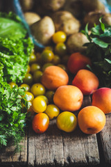 Spring fruits, vegetables and herbs (apricot, tomato, potatoes, mint, dill, parsley)