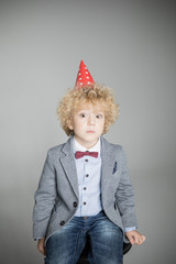 Boy in cone hat