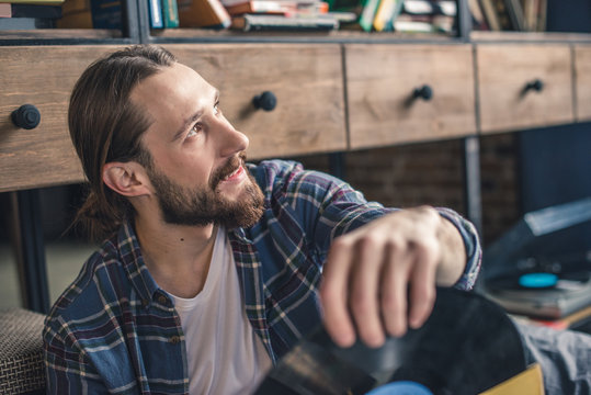 Man Holding Vinyl Record