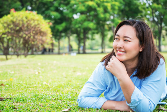 Portrait Beautiful Happy Woman Beauty Smiling In The Park. High Resolution Image