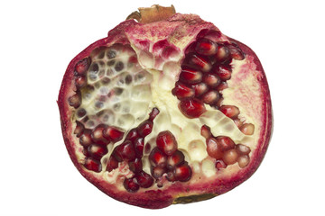 half pomegranate fruit  isolated on  white  background