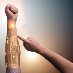 Human robotic hand in futuristic concept