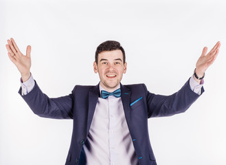 businessman in suit stretching out his hand for shaking while.