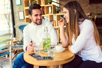 Young Couple Having Cup of Coffee