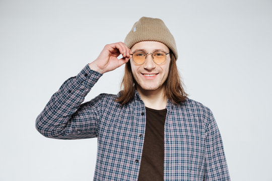 Smiling hipster in eyeglasses