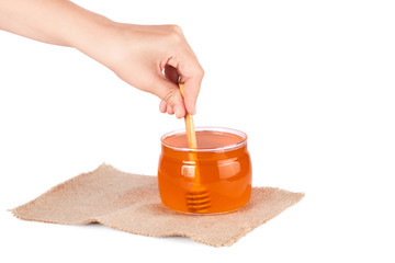 Glass jar with honey