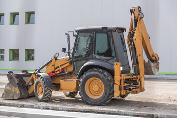     construction     machine     industry     bulldozer     machinery     excavator     shovel     yellow     equipment     work     vehicle     hydraulic     industrial     caterpillar     bucket