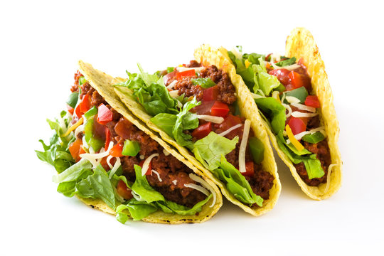 Traditional Mexican tacos with meat and vegetables, isolated on white background
