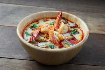 Tom yum kung on wood table