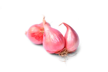 fresh and red shallots isolated on white background