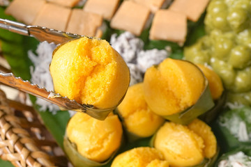Thai sweets, or Khanom Thai, have unique, colorful appearance and distinct flavors. The art of Thai desserts have been passed down through generations. Sweet sugar palm cake