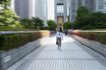 View of asian woman walking outdoor in Tokyo