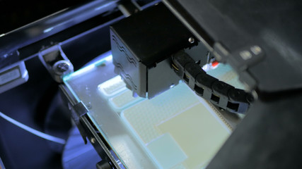 Fototapeta na wymiar Three dimensional printing machine. 3D printer during work
