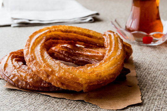 Turkish Street Dessert Halka Tatlisi with tea.