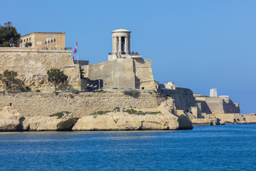 Fototapeta na wymiar Malta Valletta lower Barrakka Gardens - Siege Bell - Fort St Elmo