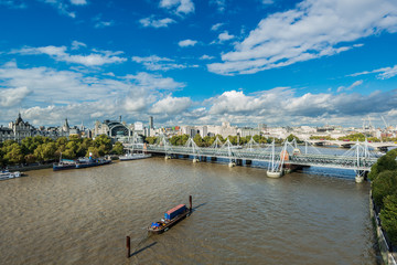 Obraz premium Hungerford Bridge and Golden Jubilee Bridges in London, United Kingdom, Europe