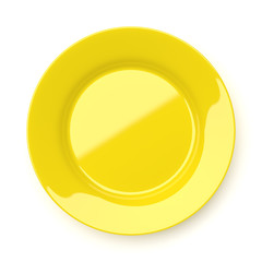 Empty yellow ceramic round plate isolated on white