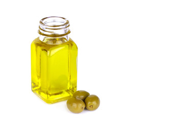 Olive oil and olives on white background