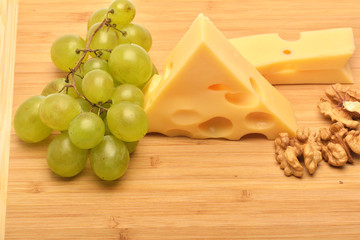 cheese on wooden board