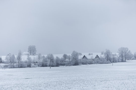 Snowy field in Hergensweiler