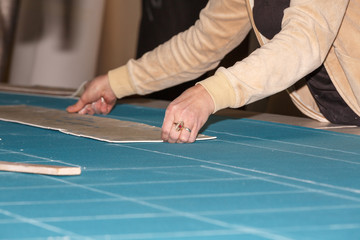 Woman hands working with patterns