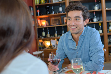 Couple enjoying meal in restaurant