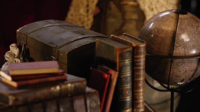 Historical pirate stuff on a old wooden table  with camera movement