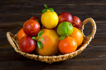 Fruit basket on wooden background