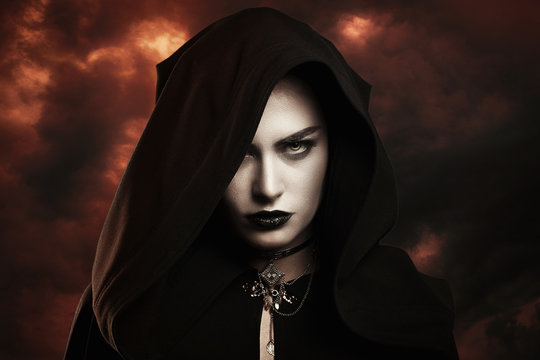 Dark witch and hellish sky