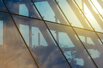 Architecture abstract background. Glass curtain walls. Fasteners elements of spider glass system....
