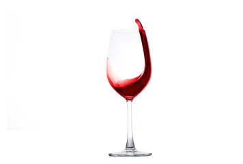Red wine splashing out of a wineglass