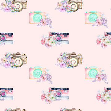 Seamless pattern with watercolor retro cameras in floral decor, hand drawn isolated on a pink background