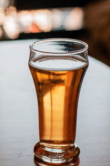 Amber beer on table indoors