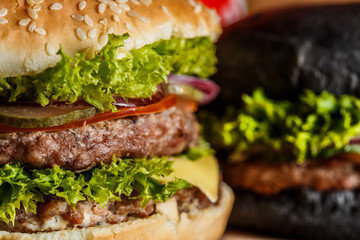  Delicious hamburger on wooden background
