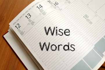 Wise words concept on notebook