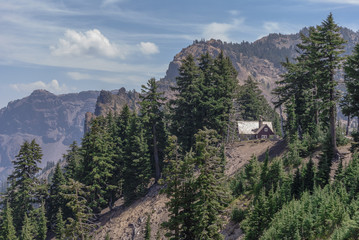 Fototapeta na wymiar House on side of Mountain.