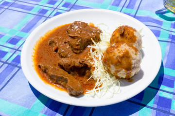 Veal stew with dumplings