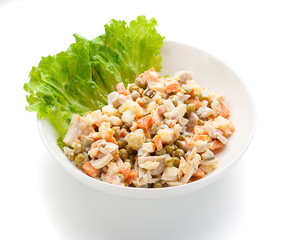 Russian salad Olivier isolated on white background