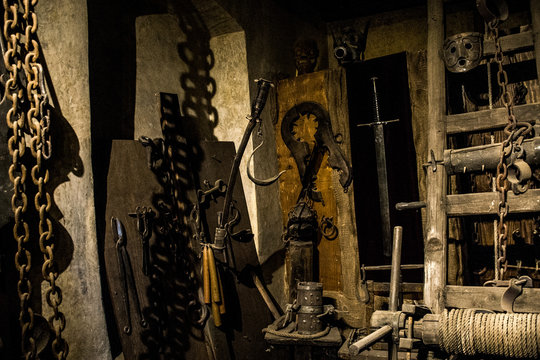 Old medieval torture chamber with many pain tools