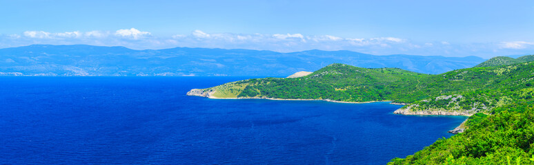 Wonderful romantic summer afternoon landscape panorama coastline Adriatic sea. The magical clear transparent azure water in the bay. Krk island. Croatia. Europe.