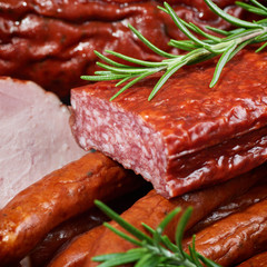 Pile of sausages with fresh herbs