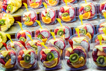 Fototapeta na wymiar Mix Of Fresh Fruit In The Plastic Box